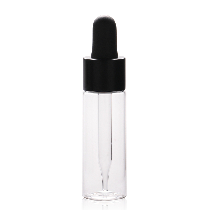 15ml Clear Tubular Glass Dropper Bottle (Tall Form) with Matte Black Cap & Rubber Bulb. Minimalist packaging for serums. SKU: SK21-G15-22065