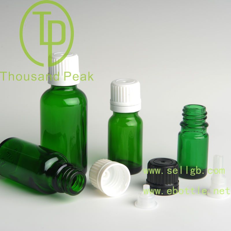 TP-2-18 amber glass bottle with tamper evident cap and orifice reducer